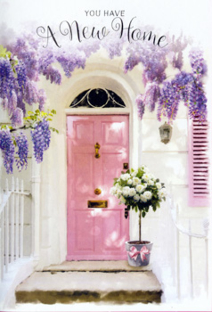 The photograph shows a dreamy Peckham doorway, dressed as if for a private little celebration of moving in. A pastel pink front door, its surface smooth and gently reflective, provides the focal point, framed by whitewashed walls that catch and soften the daylight. Just to one side, a shutter painted in a slightly paler blush shade adds balance, as though the whole façade has been composed with an artist's eye. Overhead, wisteria is in full, tumbling glory, the blooms in shades of lavender and soft purple hanging down in cascading strands. Each flower cluster forms part of a loose, natural canopy that feels both romantic and slightly wild, like the overgrown charm of some of Peckham's older terraces tucked away off Rye Lane. At the foot of the door, resting squarely on the step, sits a florist's tin bucket, painted a calm dove-grey. It brims with white and cream roses, the roses tightly clustered yet lush, their velvety petals curled outwards as though mid-sigh. Sprigs of soft green foliage weave between the roses, offering contrast and giving the arrangement an effortlessly gathered feel. A satin-like pink ribbon circles the bucket, its tails trailing gently, echoing the colours of the door and tying the whole scene together. The light seems to glow, dappling the stone step and warming the petals, suggesting a late afternoon or early evening when a new homeowner might first arrive. Overall, the image radiates gentle excitement and reassurance-the sort of comforting, beautiful welcome that a local Peckham florist would be proud to deliver for a housewarming on a quiet street near Bellenden Road, where every flower helps the new place feel instantly like home.